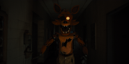 Foxy running down the hall before slashing Jeff off-screen.