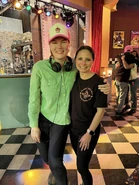 A photo of Emma with a crew member.