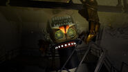 A screenshot of Big Top climbing down from the ceiling.