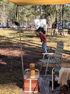 Filming of Garrett playing with the airplane.
