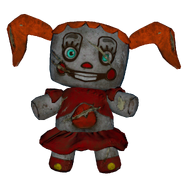 Damaged Red PlushBaby as seen in Ruin.