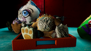 Plushie with damage matching that of Headless Glamrock Freddy's.