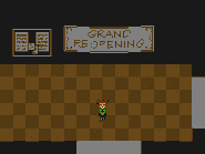 A room with a sign that reads "GRAND REOPENING".