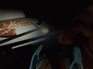 ...and the coin will appear next to the pizza box.