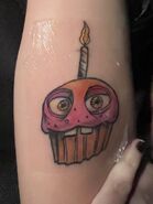 Joseph Poliquin’s Mr. Cupcake Tattoo.