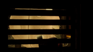 Arnold hiding in a locker as Sleepy Moon passes by it.