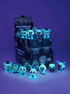 Glow-in-the-Dark series 1 Mystery Minis glowing.