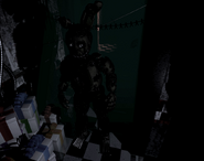 Springtrap on CAM 08, 1st position, lights off.