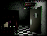 The Primary Party Room with no one there and a door open.