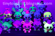 Mystery Minis under a blacklight