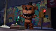 Freddy Fazbear in front of a telephone.
