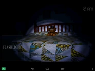 The Bed in mobile, with the flashlight on.