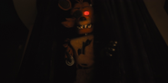Foxy pulling back the Pirate's Cove left curtain.