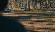 Mike watching as Garrett is being taken away by William.