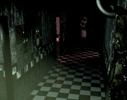 Springtrap on CAM 02, 2nd position, lights off.