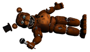 Withered Freddy laying on the floor in Parts & Service.