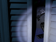 Nightmare Mangle standing in the Closet.