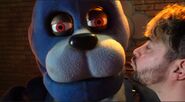 Razz about to kiss Bonnie.