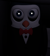 The Penguin as seen under the desk.