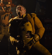 William punctured by spring locks as the animatronics surround him.