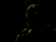 One of Springtrap's twitches, revealing a close view of William Afton's corpse.