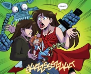 The Suicide Bot stabbing Charlie, Elizabeth, and the Ella rag doll.