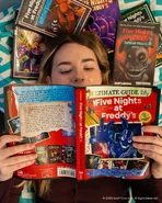 UG2 Promo.jpg (556 KB) The book in the background of a Ultimate Guide Version 2.0 promo.