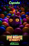 Poster of Mr. Cupcake in a ball pit.