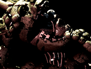 Springtrap revelando el rostro putrefacto de William (Imagen 3).