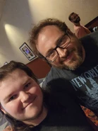 A photo of Scott with a fan.