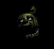 Springtrap's head as it appears for a few seconds on mobile port for the third game before the main menu screen starts.