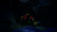 Prototype Glamrock Freddy lying under the rubble.