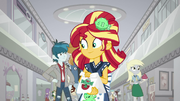 Sunset Shimmer is holding something