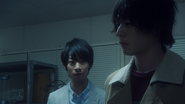 Takumi Katsuragi shows Ryuga Banjo a picture of him and Sento Kiryu are no longer being separate entities