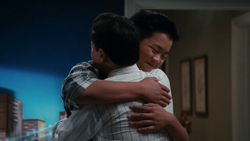 Eddie hugs Louis