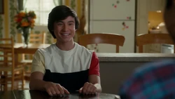Emery smiles as he listens to Eddie