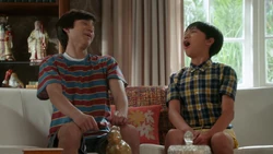 Evan laughs alongside Emery