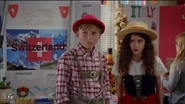 The Swiss boy and girl choosing to be "neutral" in Eddie's argument about China vs. Jamaica