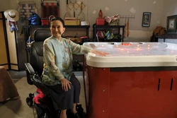 Jenny is happy to get her hot tub