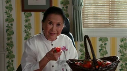 Jenny eating her tomatoes
