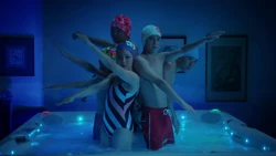 The Huangs perform in the hot tub