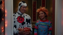 Jessica hands out raisins with Louis