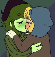 Natasha and Mollie kissing.