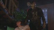 Jason killing Eddie by slashing him in the neck with his machete.
