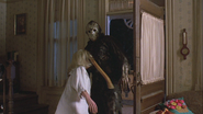 Melissa hacked in the face with a axe by Jason Voorhees.