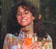 Annie after getting her throat slashed by Pamela Voorhees.