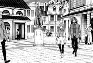 Frieren and Stark walk by a Himmel statue in Heiß.
