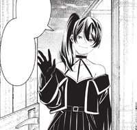 Übel's outfit with her coat