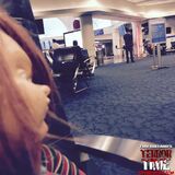 Chucky sits and waits... his victims...I mean fellow passengers, unaware...