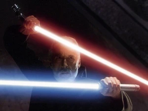 Dooku se sert de deux sabres laser.